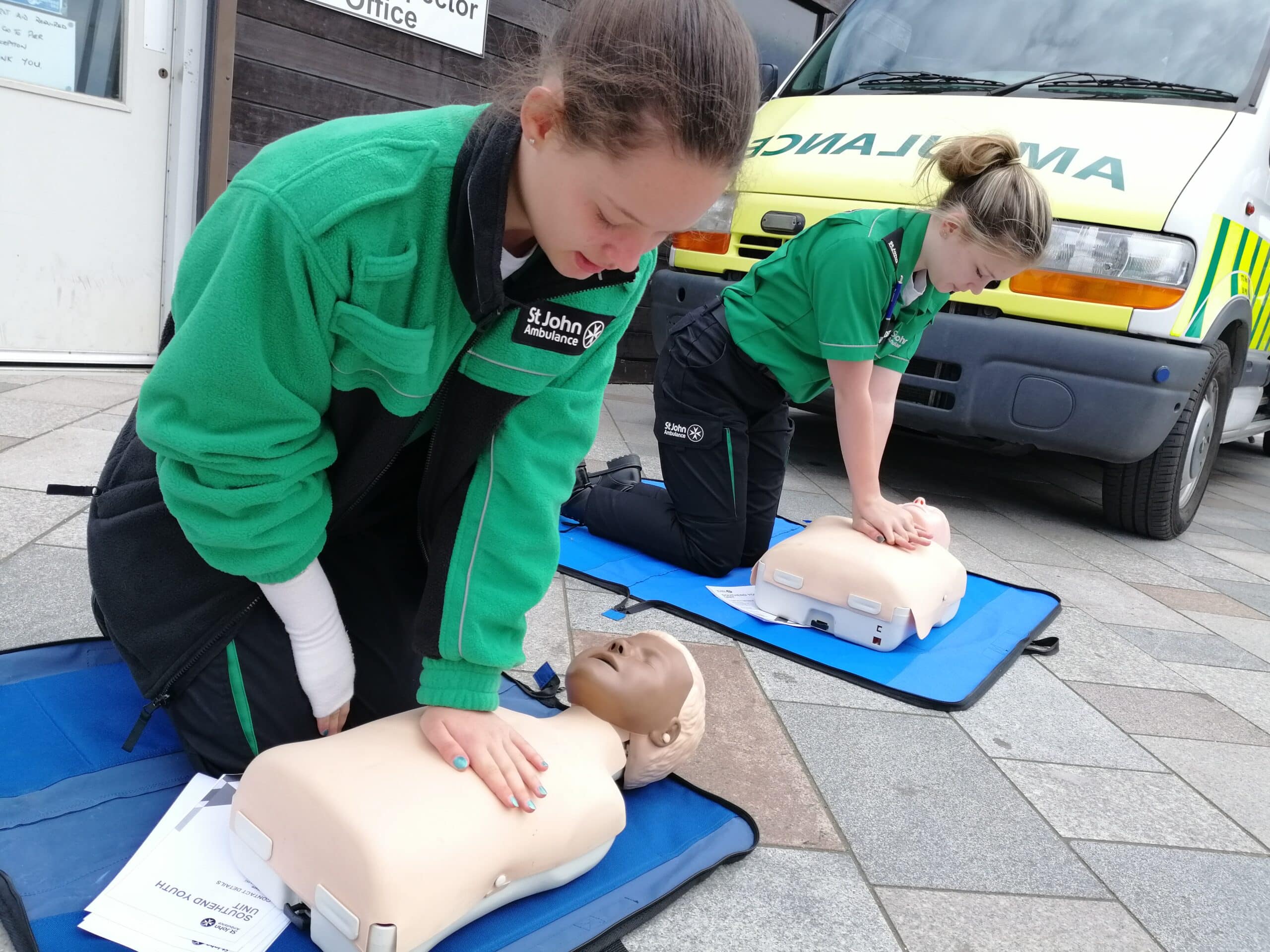 girl giving cpr